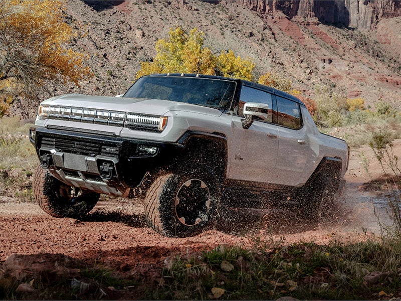 2024 GMC Hummer EV front view showcasing its distinctive grille design